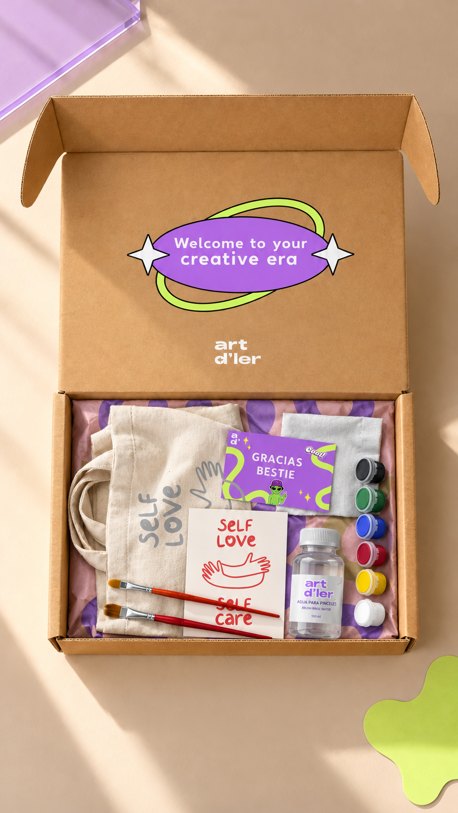 Caja abierta del kit Art D'ler con materiales para pintar